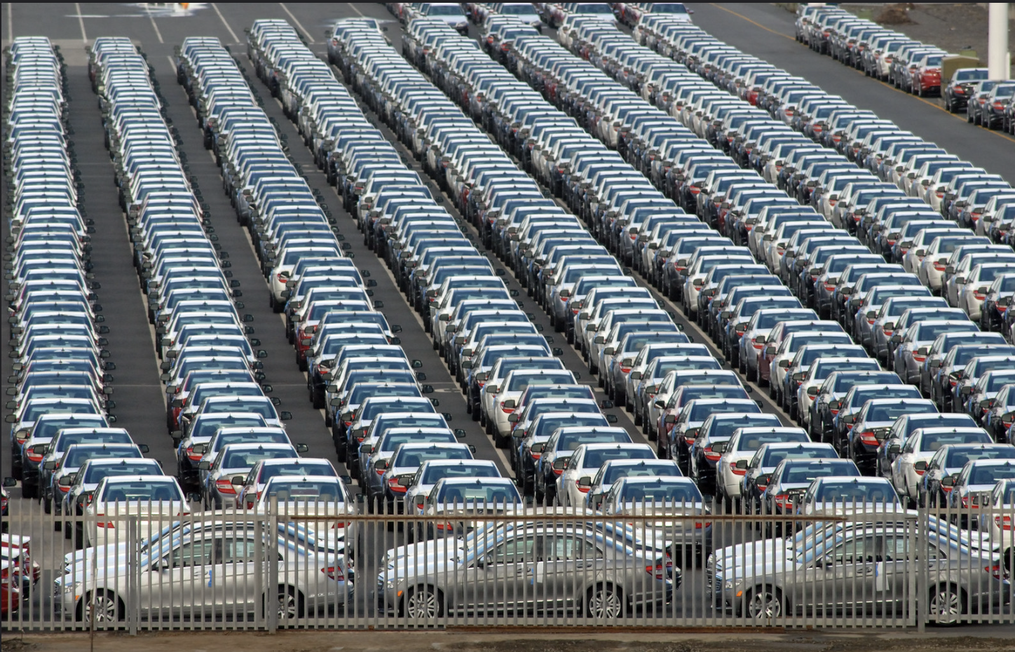 Rows of newly manufactured cars at a South African port awaiting export